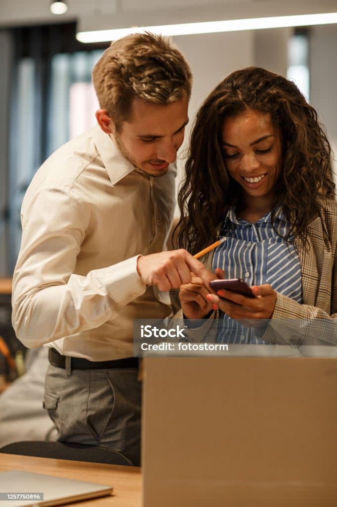 Business team reviewing performance data together