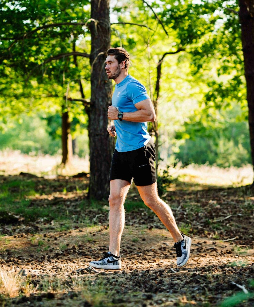 A man jogging outdoors in the morning