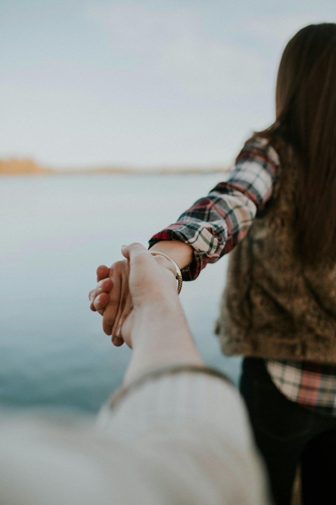 Two people connecting warmly
