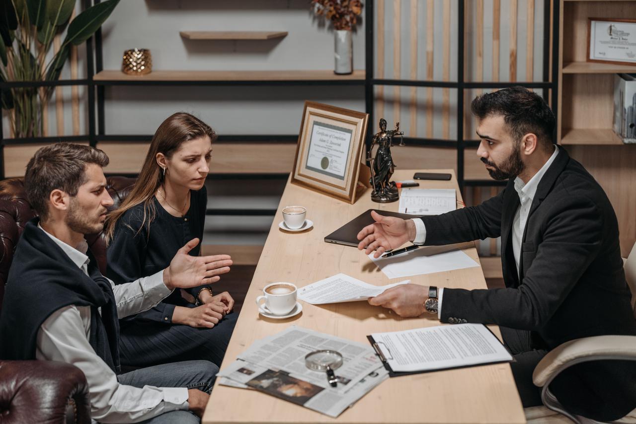Diverse attorneys collaborating around a conference table in a law office