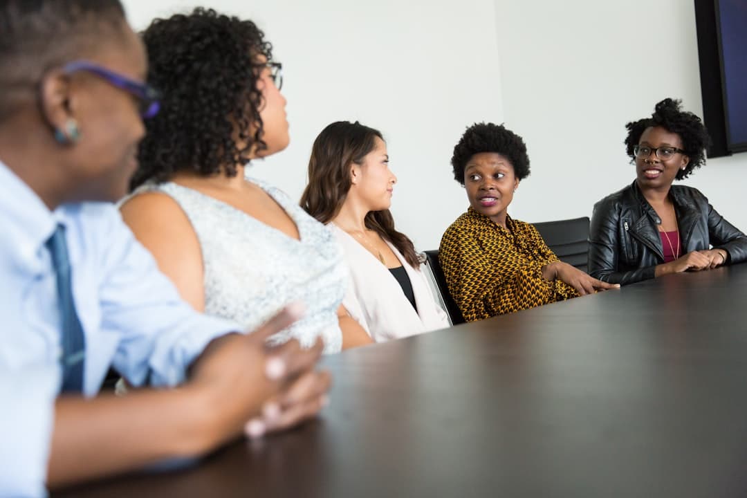 Diverse research participants and team members in discussion