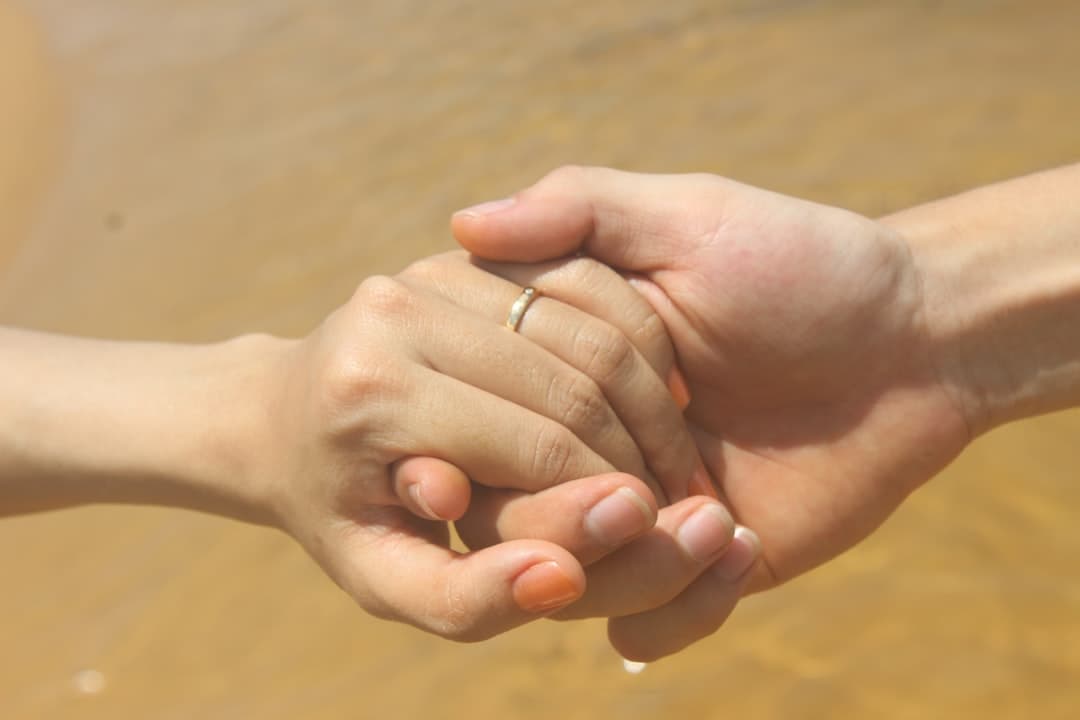 Two people connecting warmly