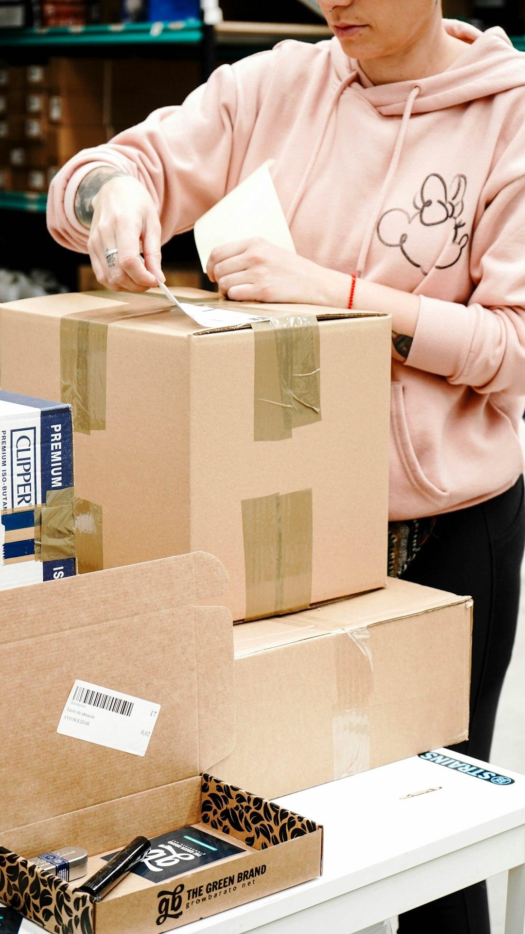 Ecommerce founder packing customer orders