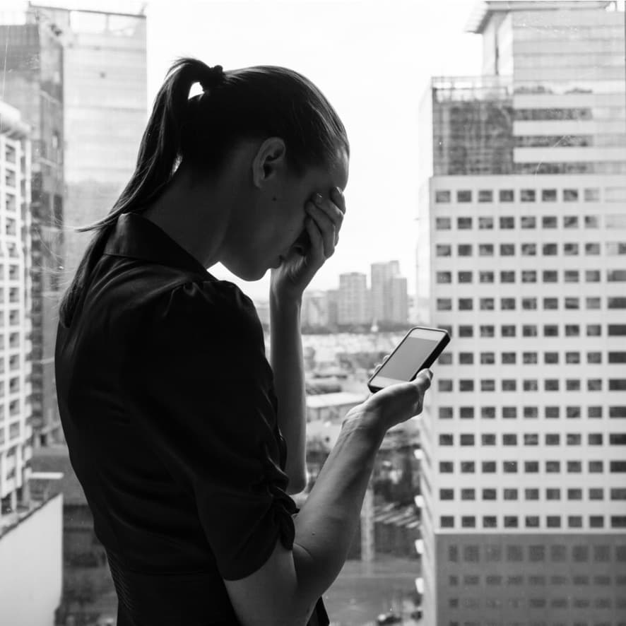 A victim of harassment receiving unwanted communication via her mobile phone.