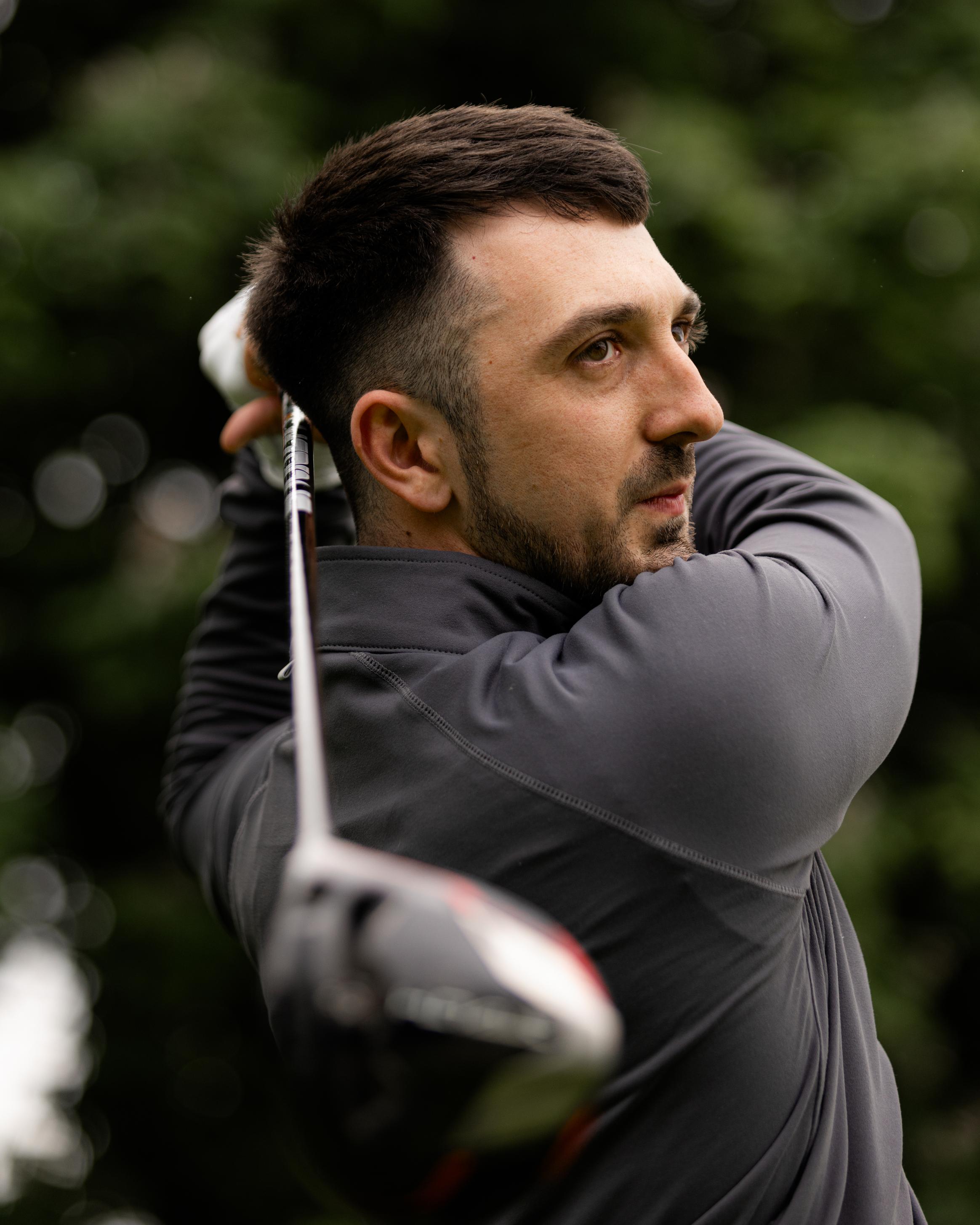 Golfer at the finish of a swing