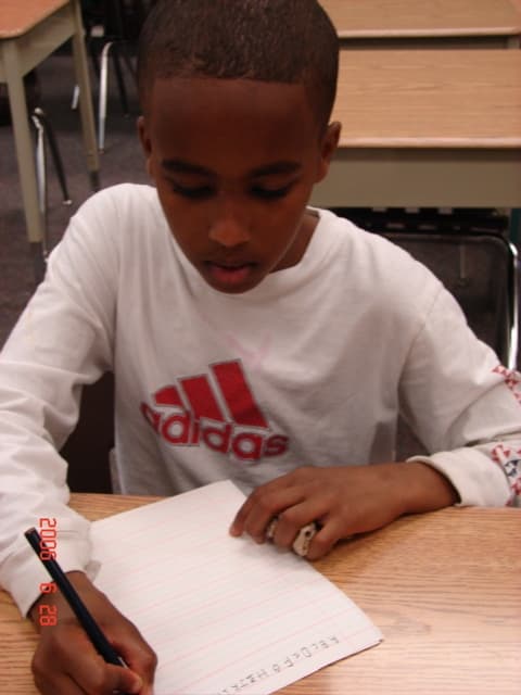 boy printing on paper